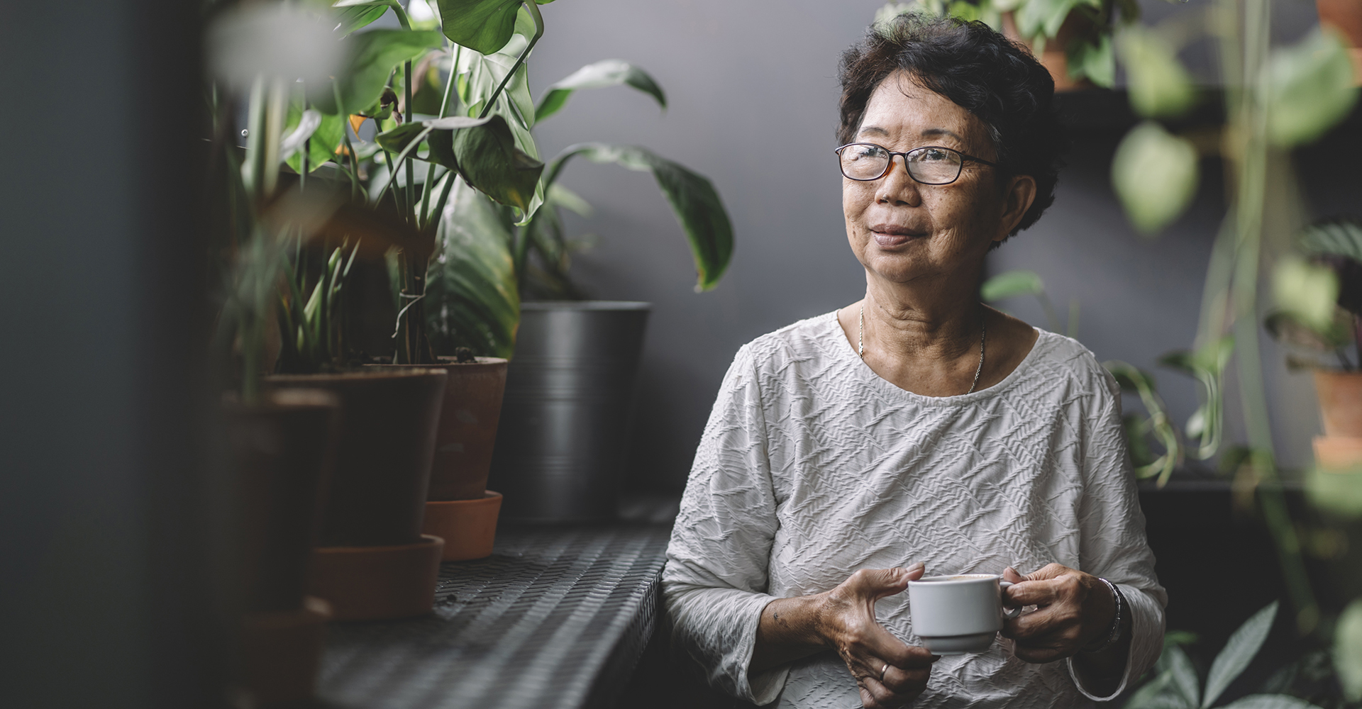 grandmother sitting at home alone