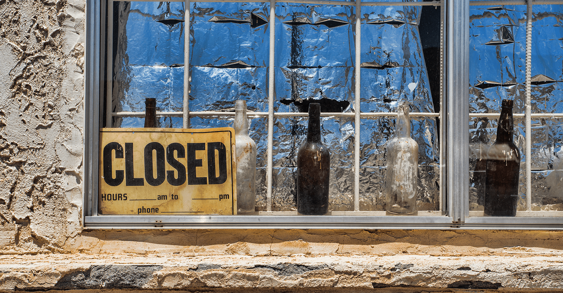 Closed sign on an abandoned restaurant
